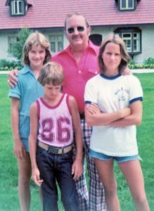 Color photo of a family of 4