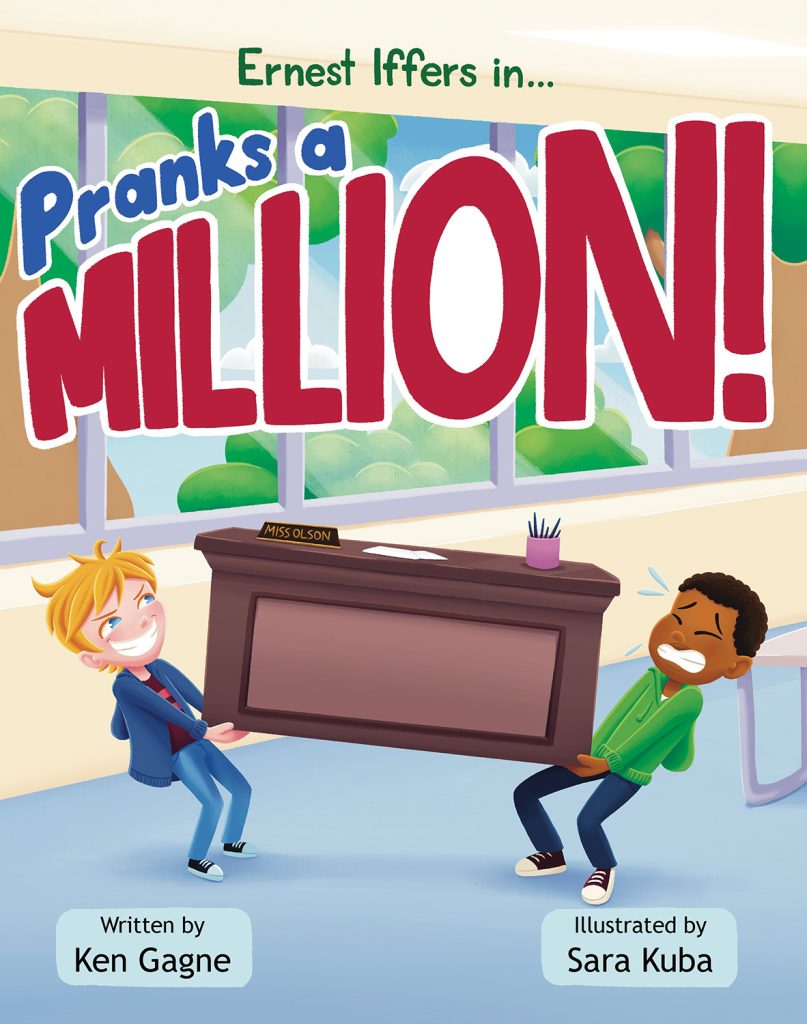Book cover: Title "Pranks a Million!" in handwritten blue and red block text. Beneath the title is an illustration of two boys lifting a teacher's desk. The boy on the left is smiling widely, while the boy on the right is wincing from